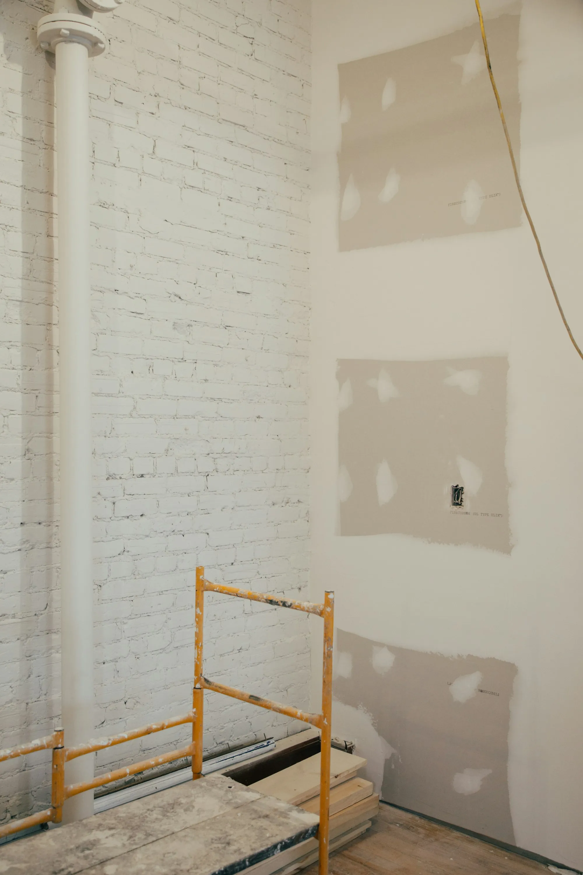 New drywall and a work platform inside a home addition